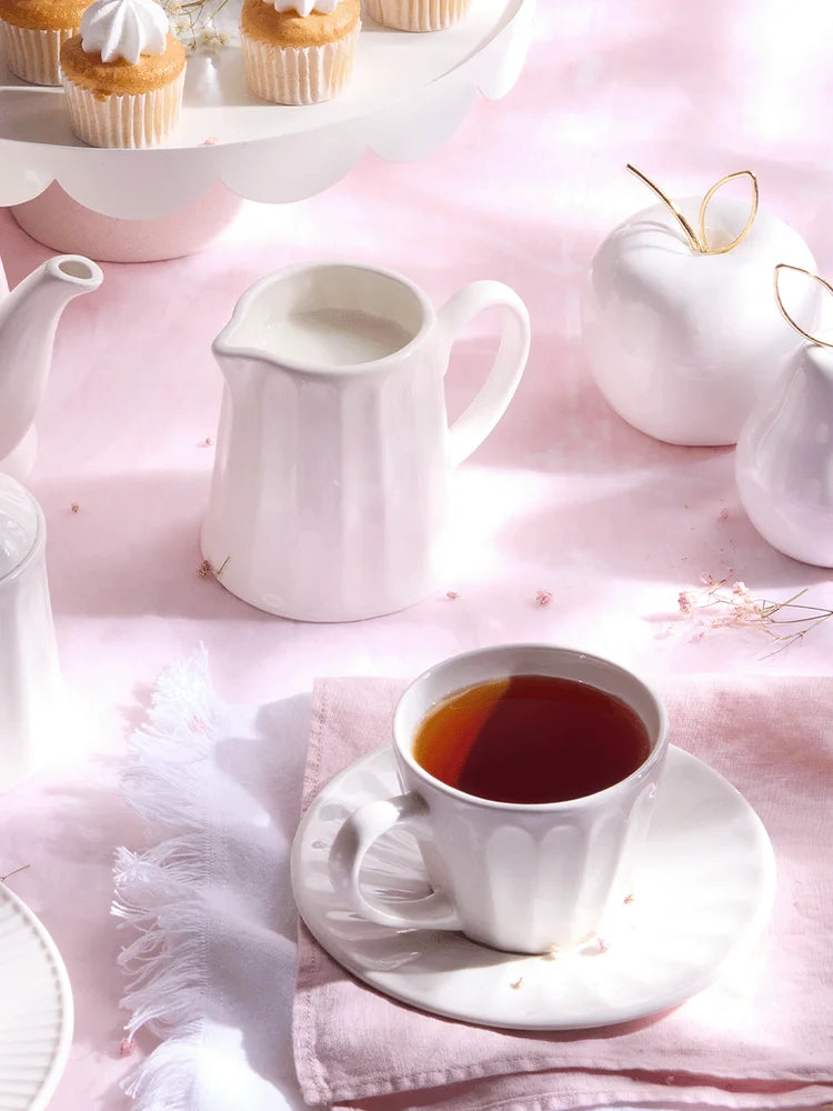 White Cup And Saucer